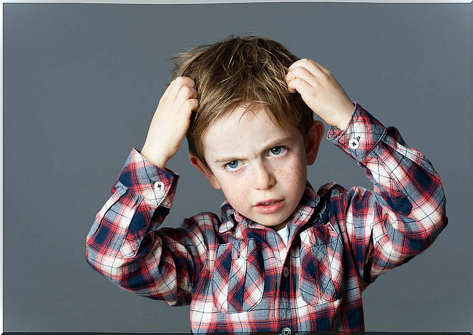 Child pulling his hair because he lacks self-control.