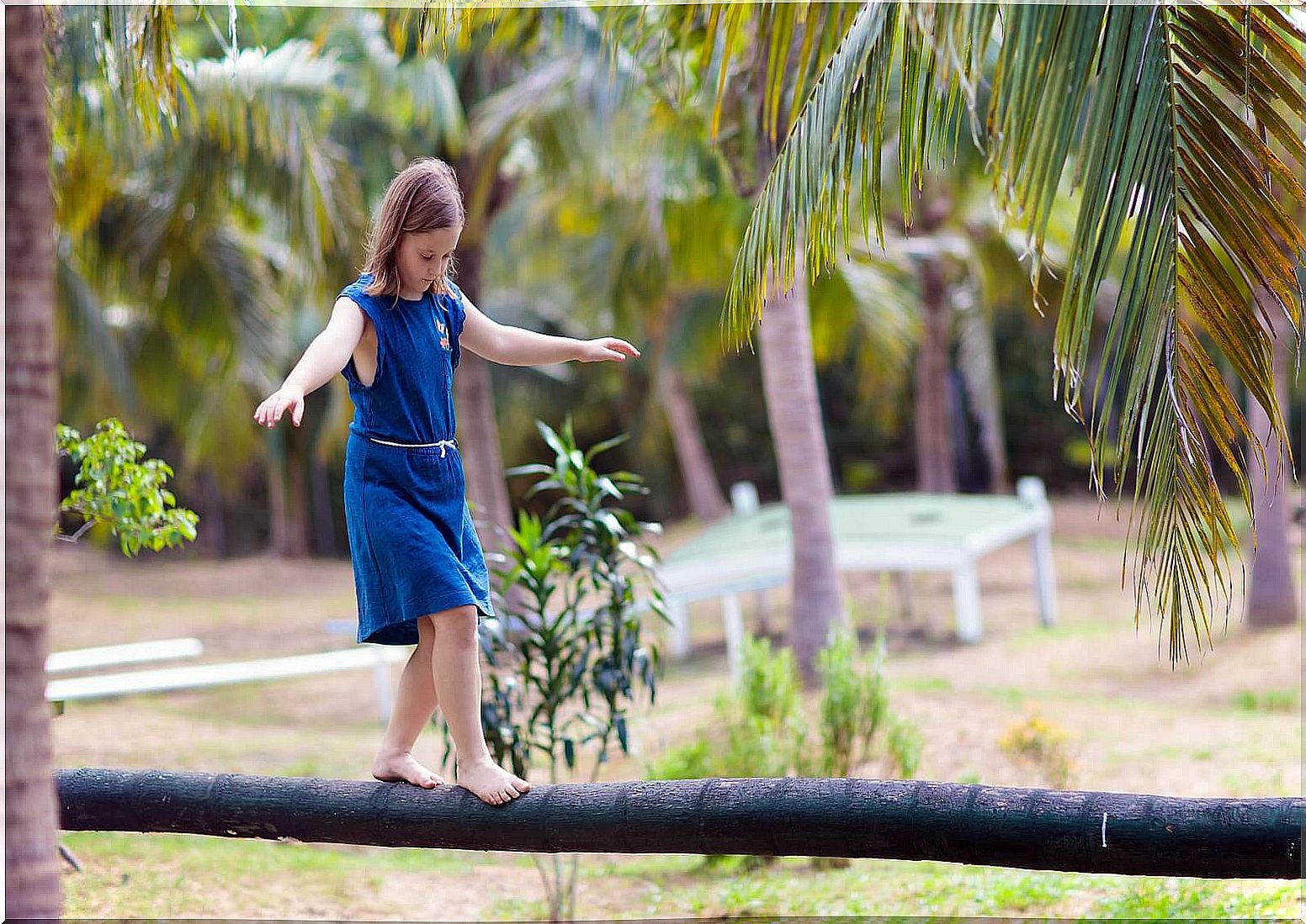 Girl doing an obstacle course.