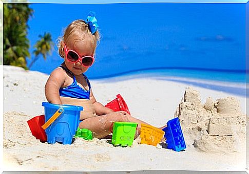 Baby on the beach for the first time