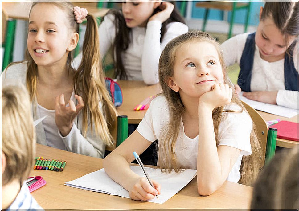 Girl using divergent thinking in class.