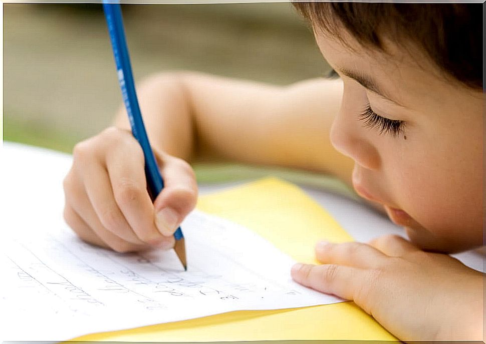 Child doing exercises to improve dysgraphia.