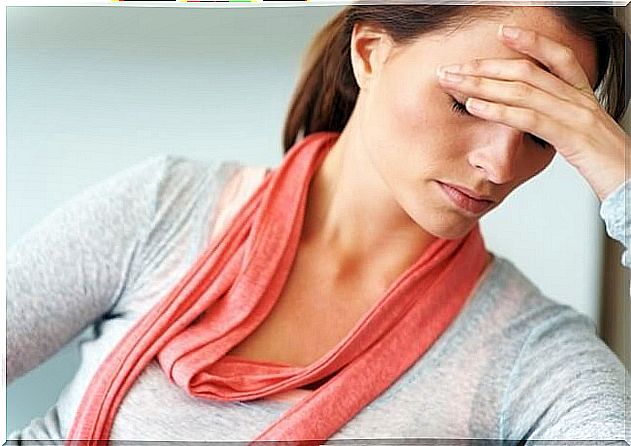 Exhausted woman with pink scarf