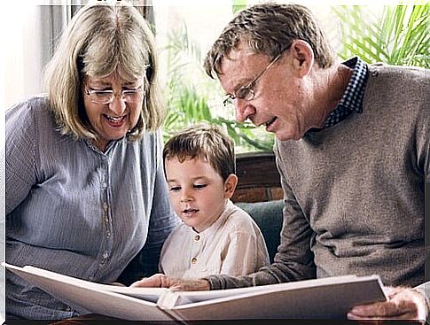 Grandparents telling a story to their grandson during visitation.