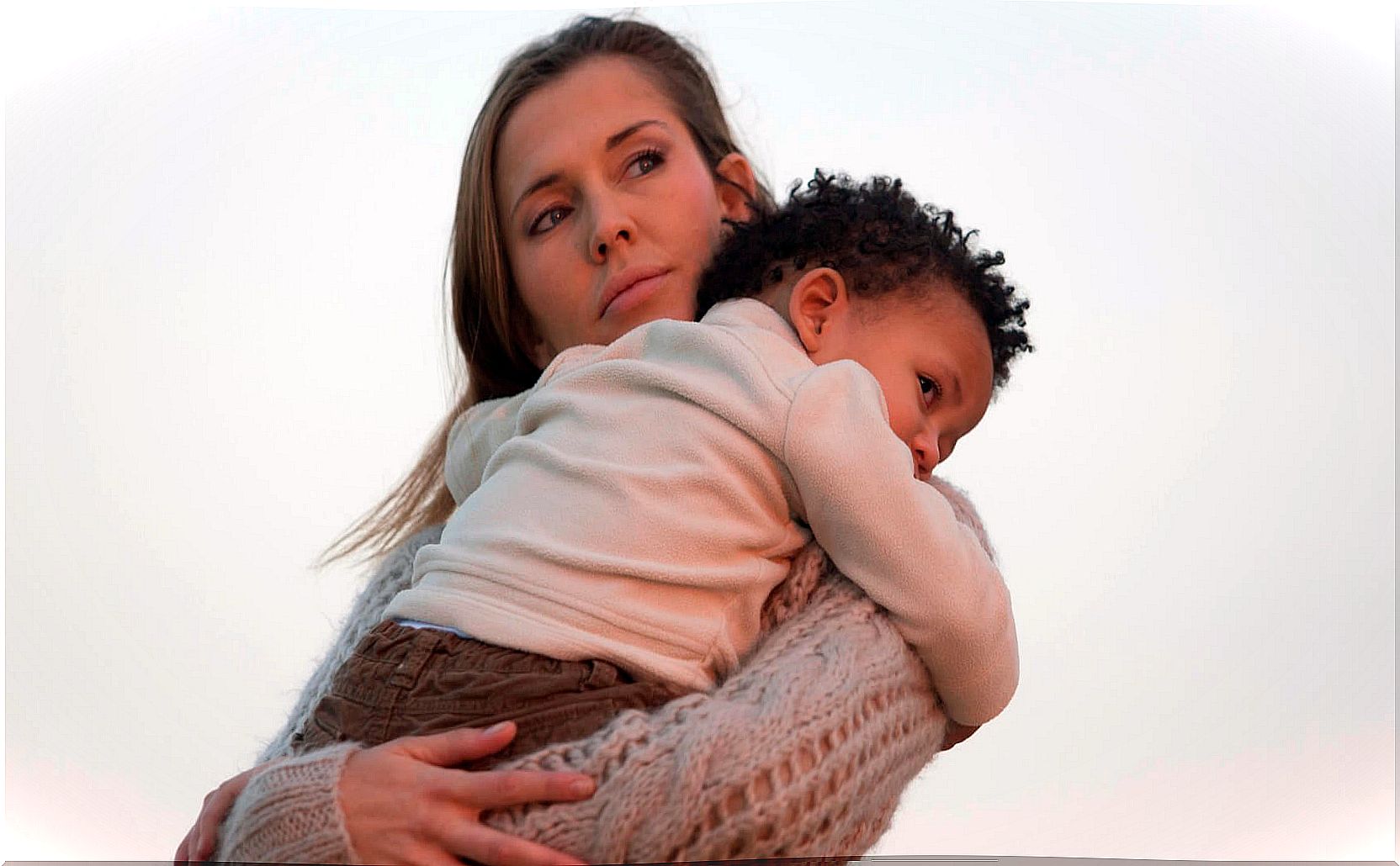 mom with her son aware that she has not treated him well