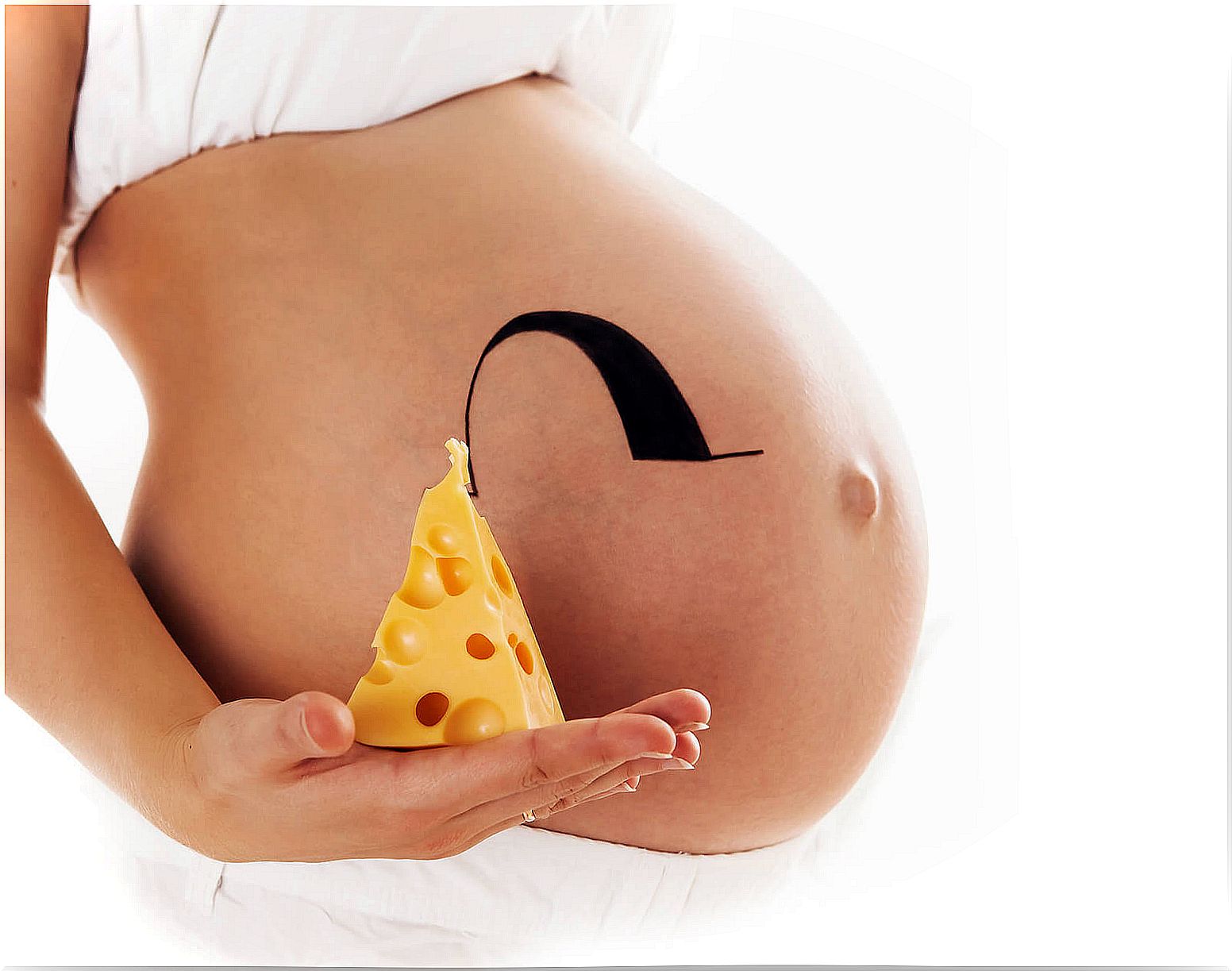 Pregnant woman next to a portion of cheese.